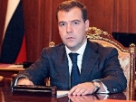 Президент России Дмитрий Медведев подписал закон об упрощении процедуры усыновления